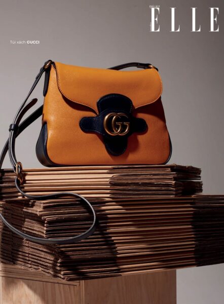 Bild einer schwarz-orangenen Gucci-Tasche