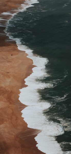 Hình nền màu nâu nhạt với bãi biển, bãi cát