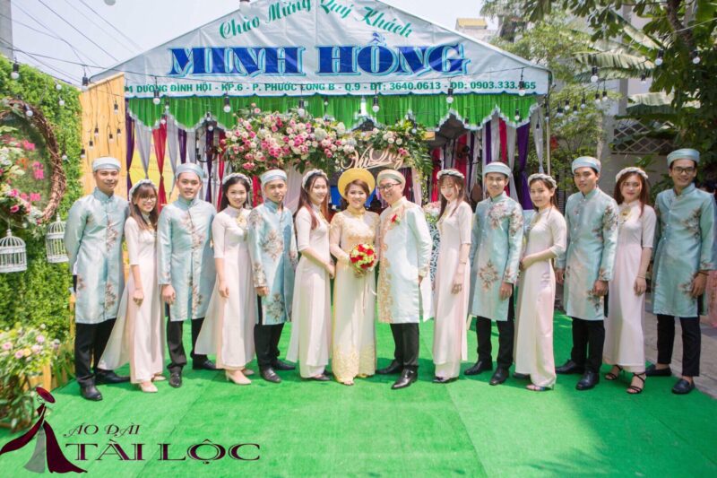 Mẫu áo dài bưng quả trắng xanh