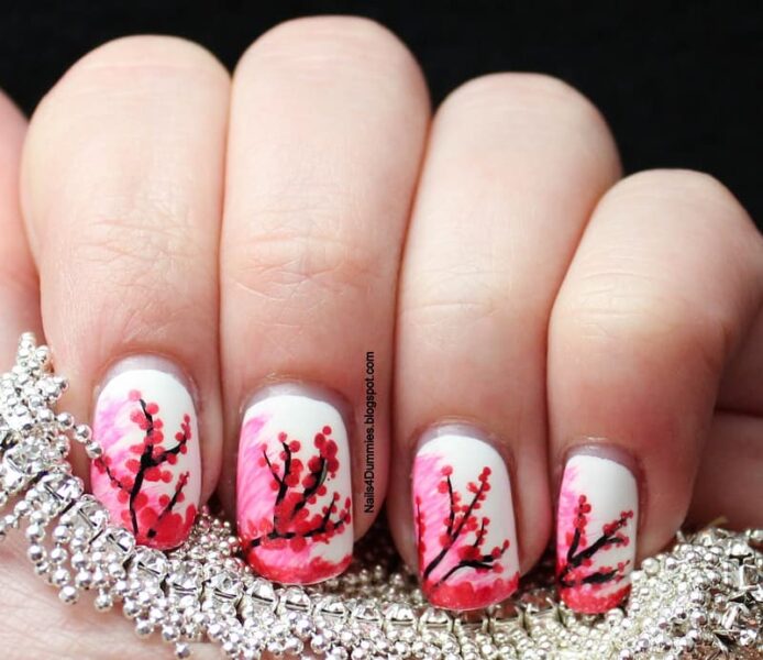 Mẫu nail hoa đào nền trắng