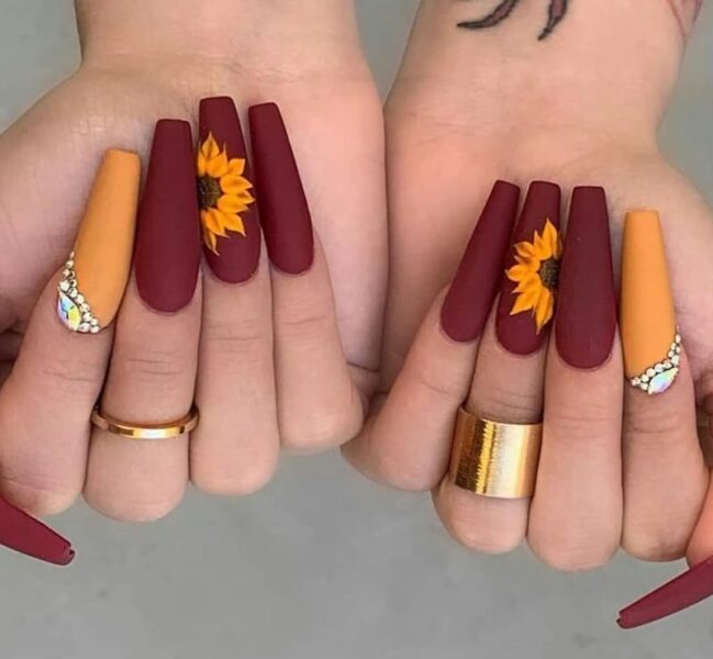 Mẫu nail hoa hướng dương cam đỏ