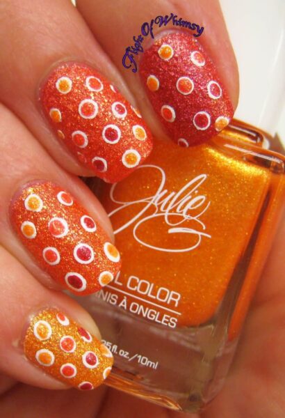 Mẫu nail màu cam chấm bi nhũ đẹp mắt