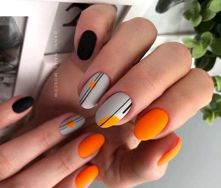 Mẫu nail màu cam móng tròn