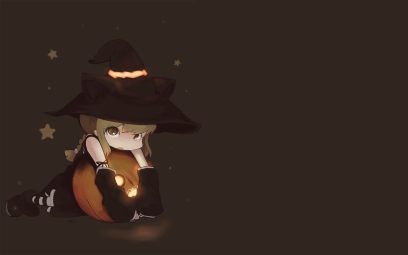 Ảnh Halloween dễ thương - phù thủy chibi cô đơn bên quả bí ngô