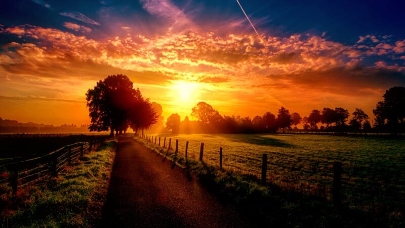 Ảnh mặc trời lặn trên con đường làng