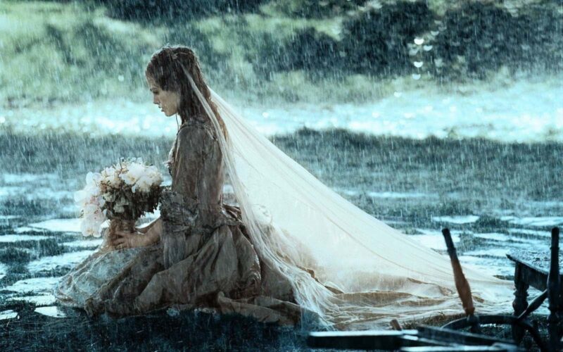 Hình ảnh buồn về gia đình - cô dâu dưới mưa