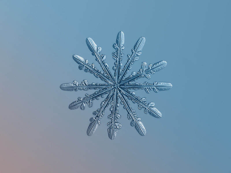 Hellblaues Schneeflockenbild