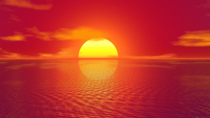 Hình nền mặt trời mọc trên biển