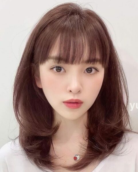 Kiểu tóc uốn layer ngang vai cho nữ