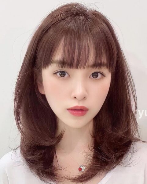 Kiểu tóc uốn layer nữ có mái